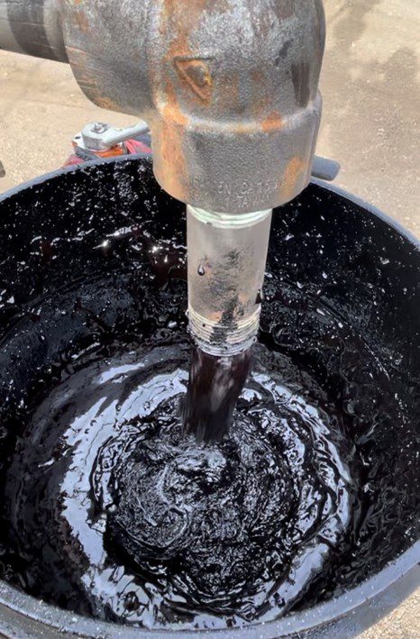 Foamy oil at surface.